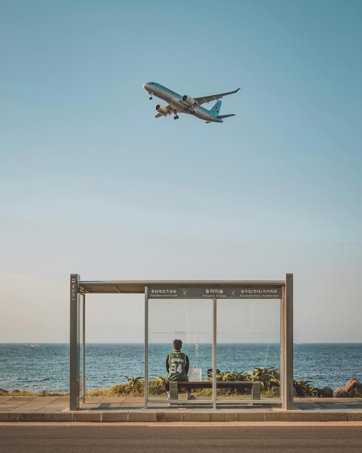 Jeju Island’s airplane stop offers stunning beach views and the sight of flying aircraft.