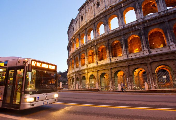 A bus stop in Rome with a view that captures the city’s historic charm and beauty.